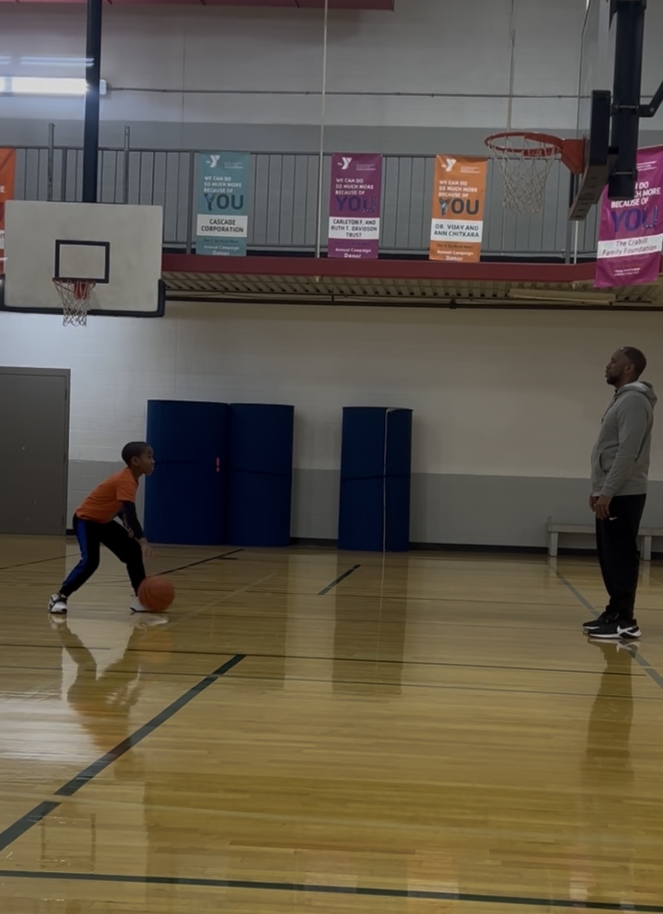 Coach Coop helping Avery